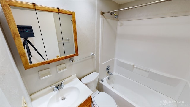 full bathroom with vanity, shower / bathtub combination, and toilet