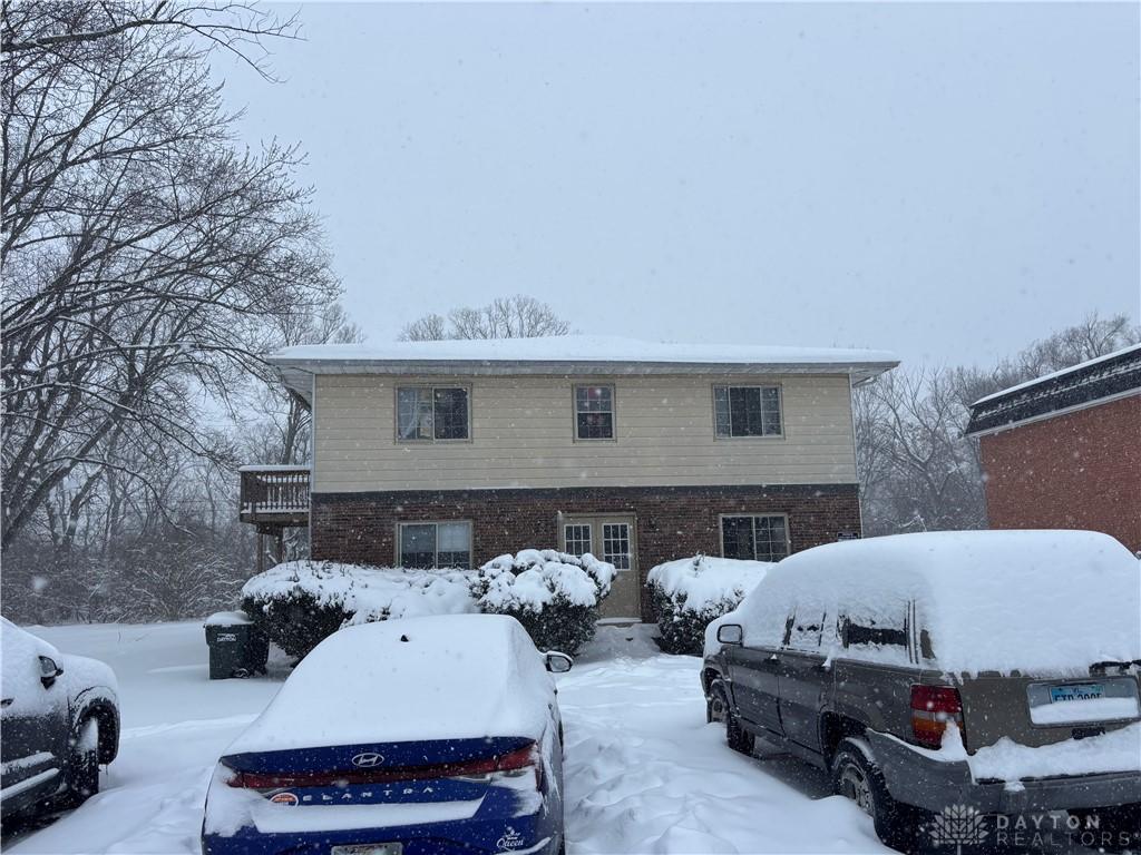 view of snow covered property