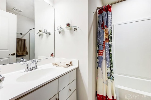 bathroom with vanity and shower / bathtub combination with curtain