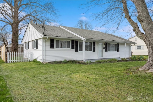 ranch-style home with a front yard