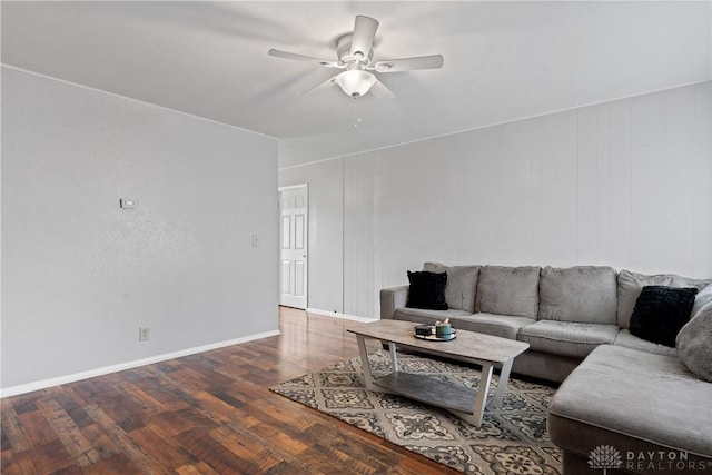 living room with ceiling fan and wood-type flooring