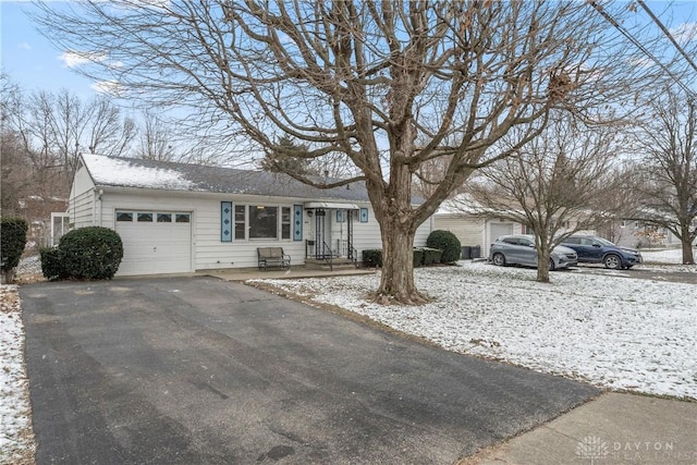 ranch-style home with a garage