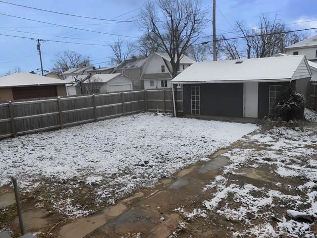 view of yard covered in snow