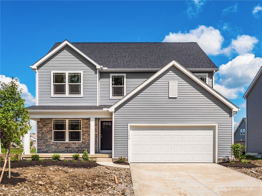 front of property featuring a garage