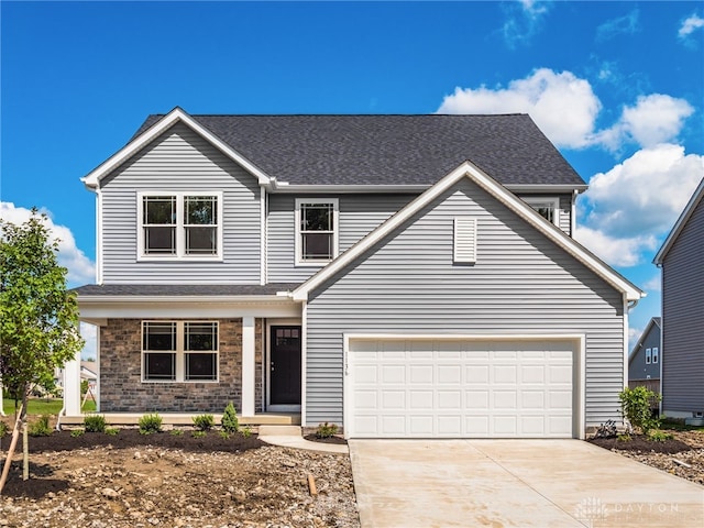 front of property featuring a garage