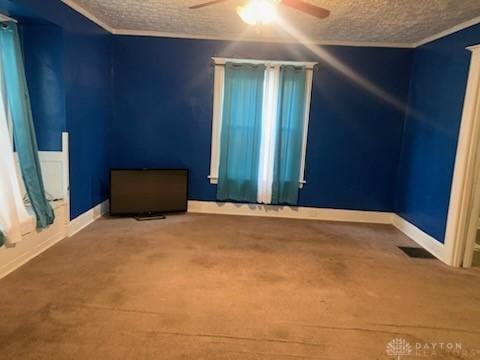 unfurnished room featuring ceiling fan