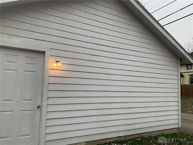 view of home's exterior featuring fence
