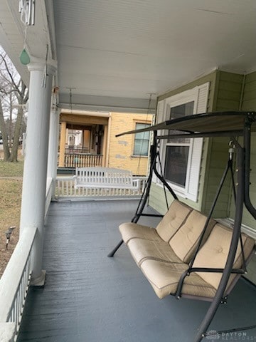 view of patio featuring a porch