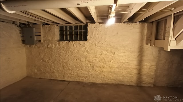 unfinished below grade area featuring electric panel