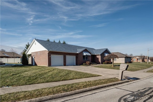 ranch-style house featuring a front lawn and a garage