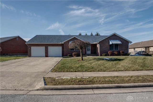 single story home with a garage and a front lawn