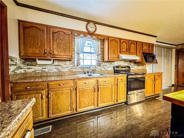 kitchen with electric range, sink, tasteful backsplash, dark hardwood / wood-style flooring, and ornamental molding