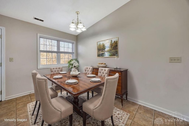 dining space with lofted ceiling, a chandelier, visible vents, baseboards, and tile patterned floors