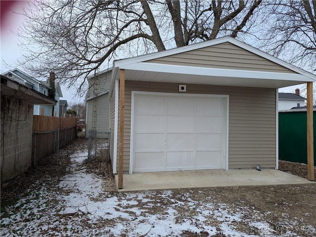 view of snow covered garage