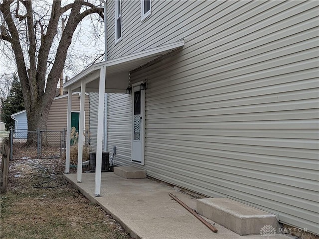 view of property exterior featuring a patio area and central AC