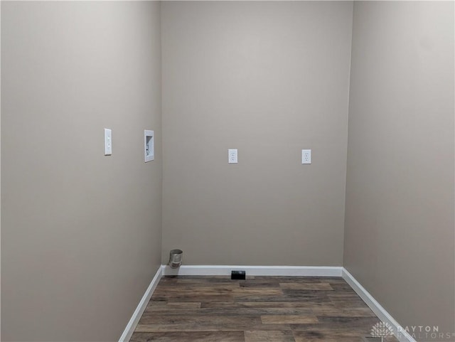 clothes washing area with washer hookup and dark hardwood / wood-style flooring