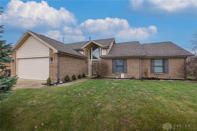 view of front facade featuring a garage and a front lawn