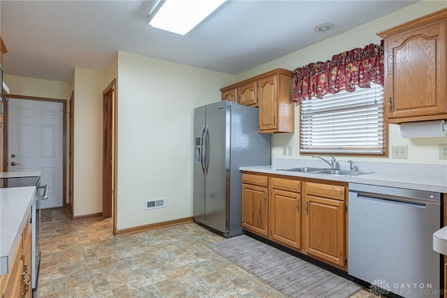 kitchen with stainless steel appliances and sink