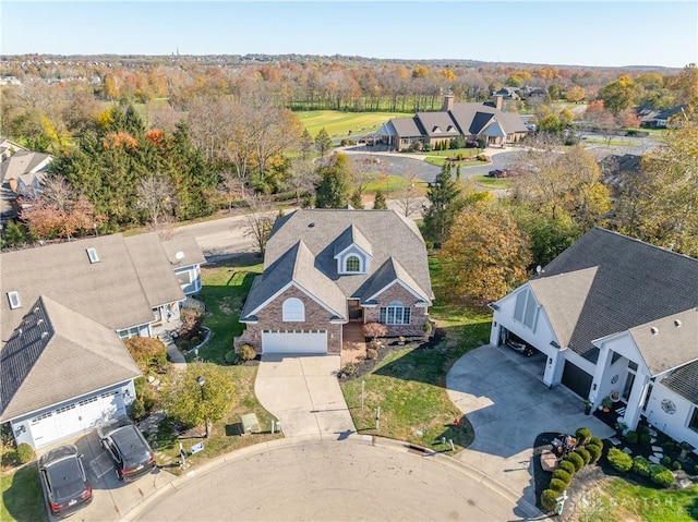 birds eye view of property with a residential view