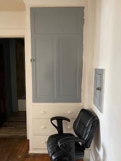 sitting room featuring dark wood-type flooring