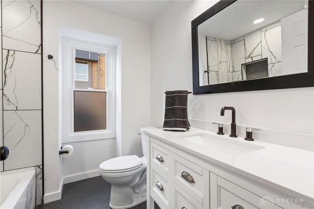 full bathroom featuring tile patterned flooring, shower / bathing tub combination, vanity, and toilet