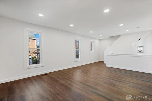 interior space with dark hardwood / wood-style flooring