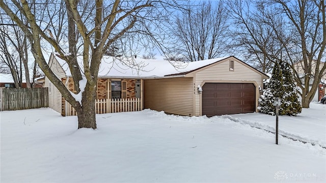 single story home with a garage