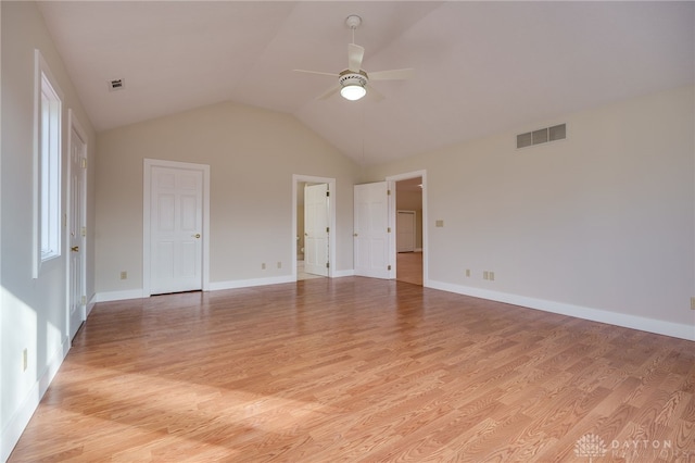 unfurnished bedroom with light hardwood / wood-style floors, ceiling fan, and lofted ceiling