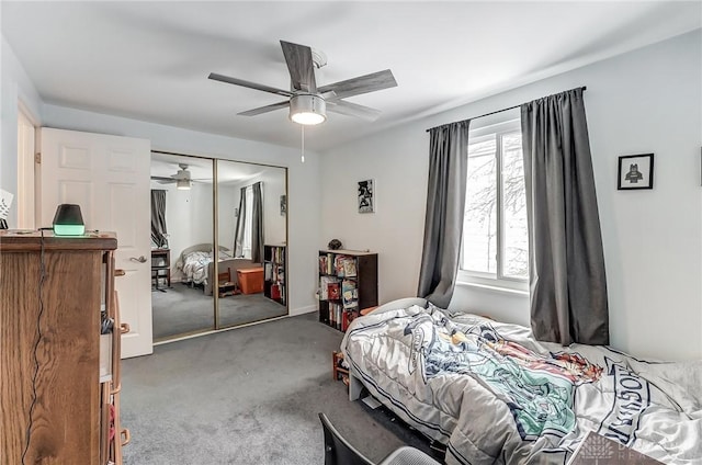 bedroom featuring carpet floors, a closet, and ceiling fan