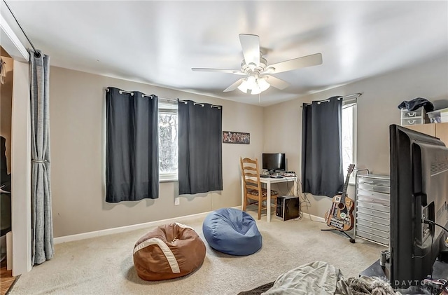 carpeted bedroom featuring ceiling fan