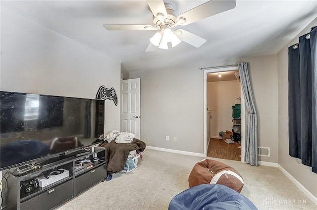 interior space with ceiling fan