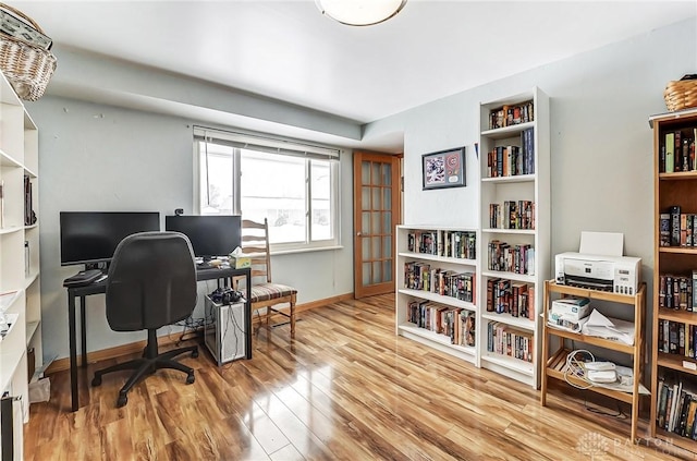 office space featuring light wood-type flooring