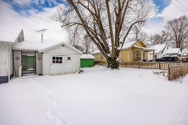 view of yard layered in snow