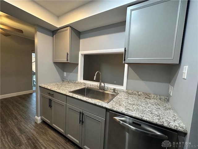 kitchen featuring gray cabinets, dishwasher, dark hardwood / wood-style flooring, and sink