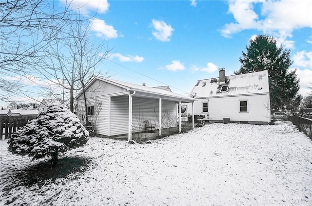 view of snow covered property