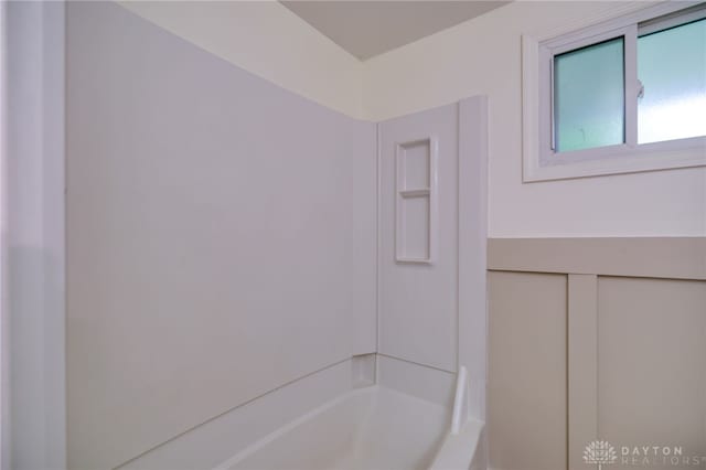 bathroom with shower / tub combination
