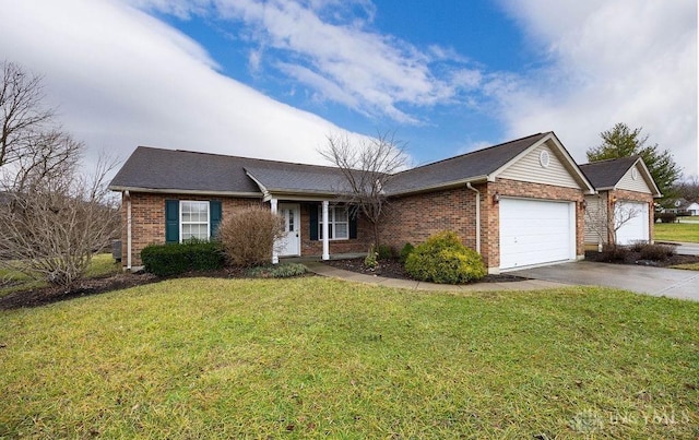 ranch-style home with a garage and a front yard