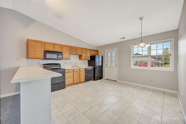 kitchen with an inviting chandelier, black appliances, hanging light fixtures, vaulted ceiling, and kitchen peninsula