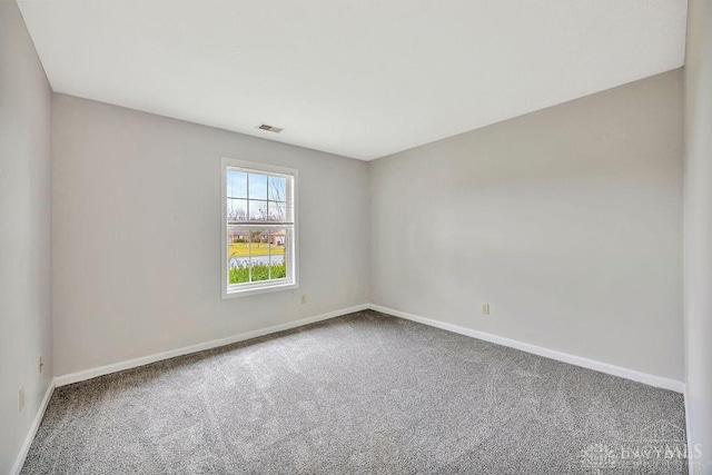 view of carpeted spare room