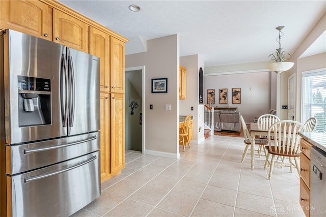 kitchen with pendant lighting, an inviting chandelier, light brown cabinetry, light tile patterned flooring, and stainless steel appliances