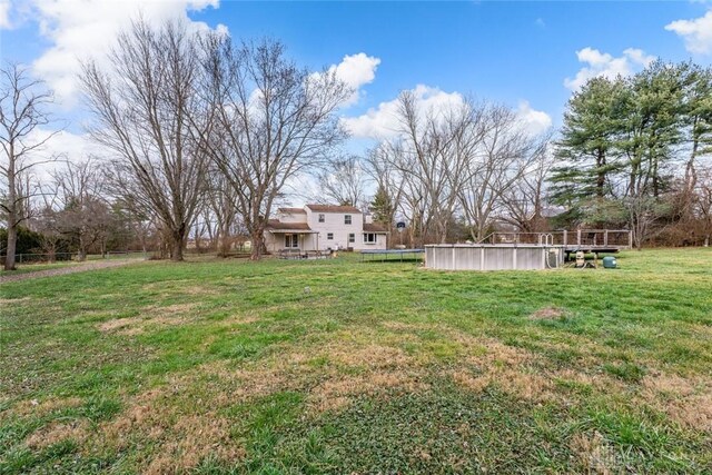 1345 Upper Bellbrook Rd, Xenia, OH 45385 - view of green lawn with an outdoor pool