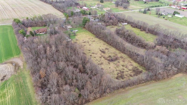 birds eye view of property featuring a rural view