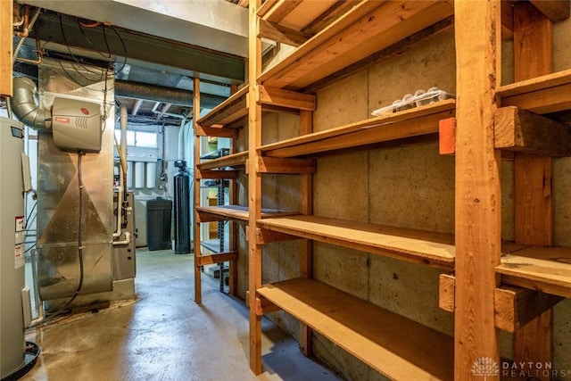 storage area featuring electric water heater