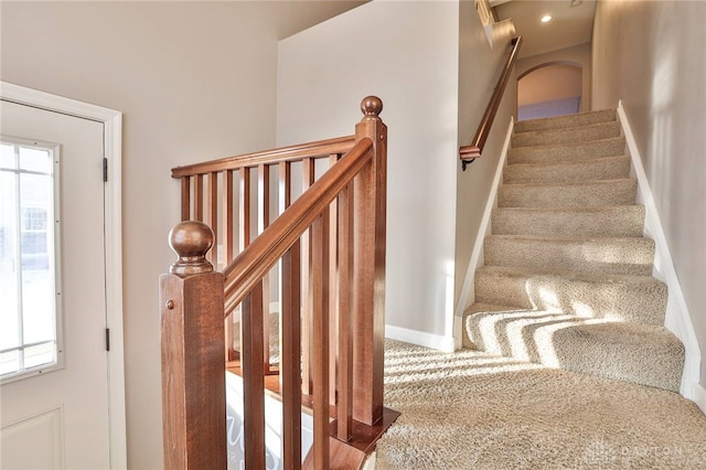 staircase with carpet