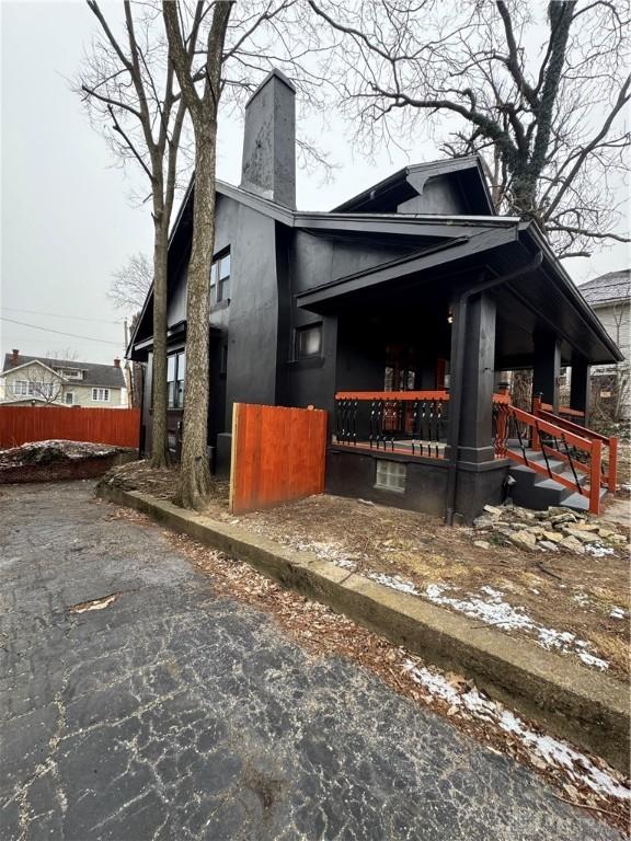 view of home's exterior featuring a porch