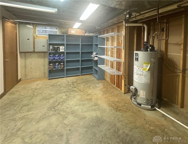 basement with electric panel and water heater