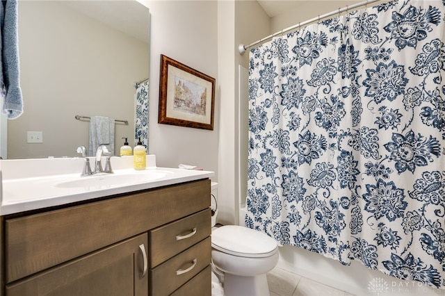 bathroom featuring a shower with curtain, vanity, toilet, and tile patterned flooring