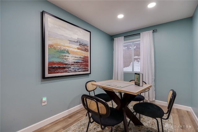 office with light hardwood / wood-style flooring