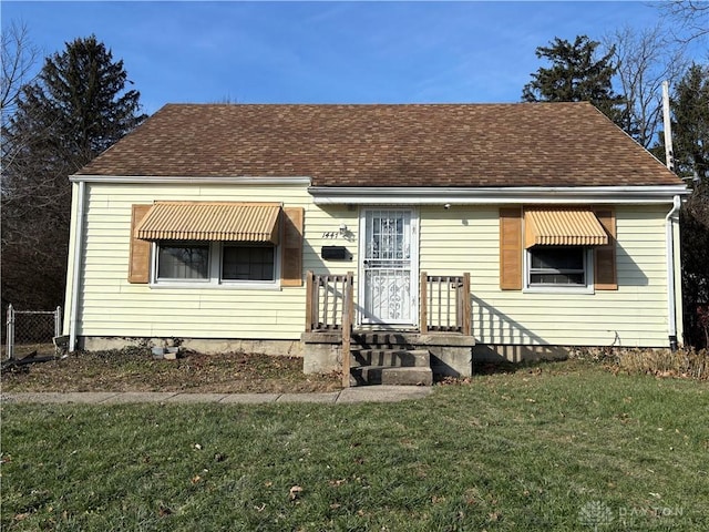 bungalow with a front lawn