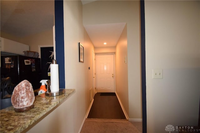 corridor with carpet floors